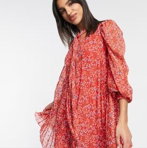 ASOS DESIGN pleated trapeze textured mini dress with neck tie in red floral